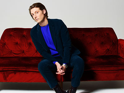 WebsiteEventList400x300-eric-hutchinson-red-couch